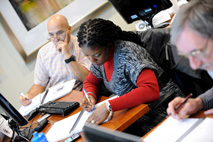 Students Ray Ortiz and Tinovia Unrah from DLA learning and taking notes during the first RO class in DC